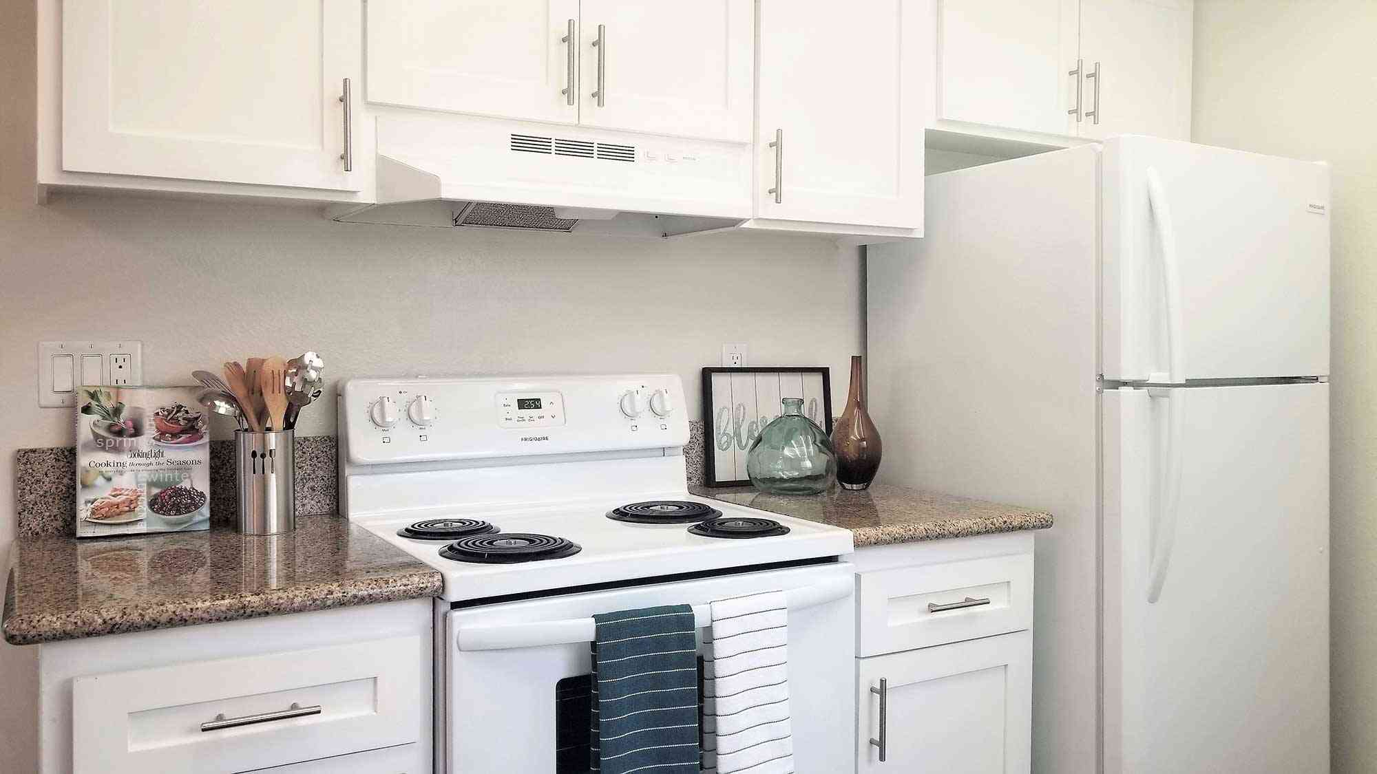 renovated kitchen with white electric range