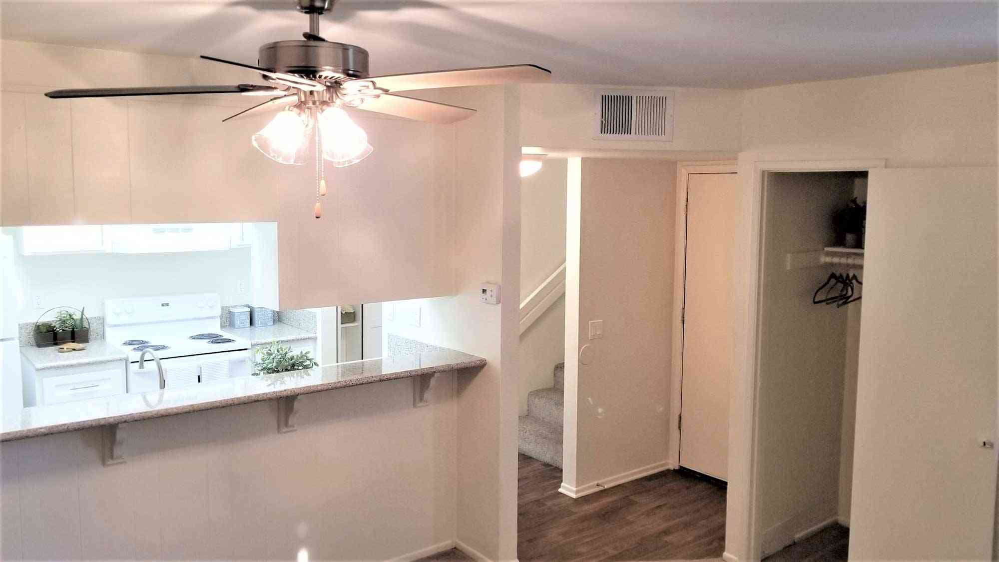 raised breakfast bar countertop and apartment entryway