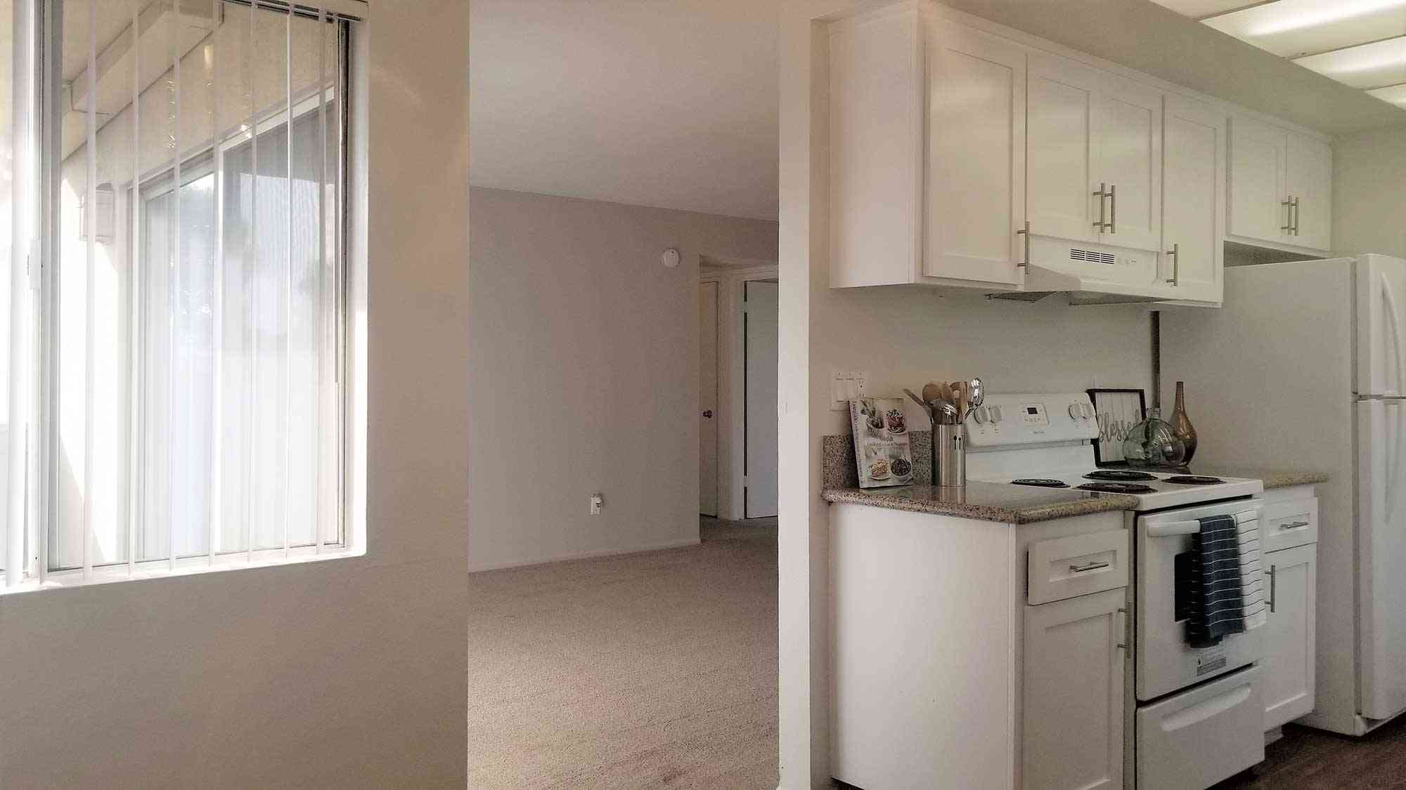 renovated kitchen leading into living room