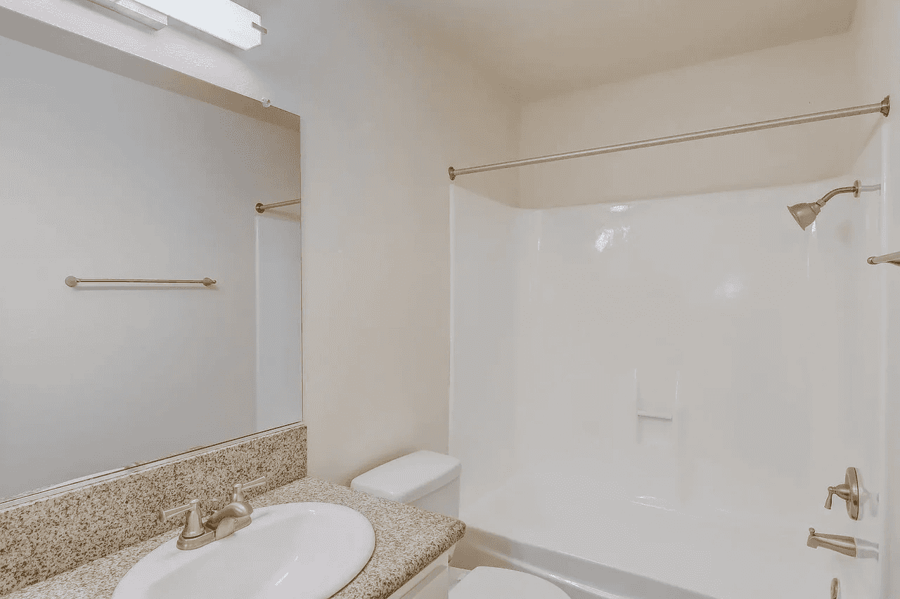 renovated bathroom with full sized soaking tub